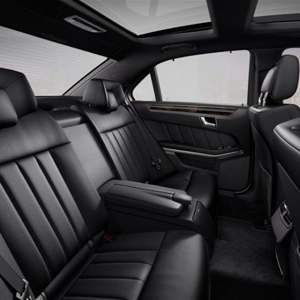 Interior rear seat of business class private chauffeur car